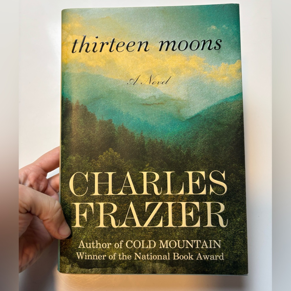 Thirteen Moons: A Novel Hardcover book